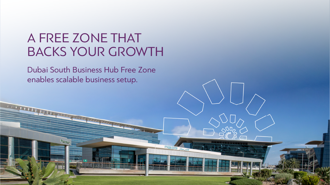 Dubai South Business Hub Free Zone, a free zone that backs your growth, with modern buildings and text "Fitness Center" and "Pharmacy.